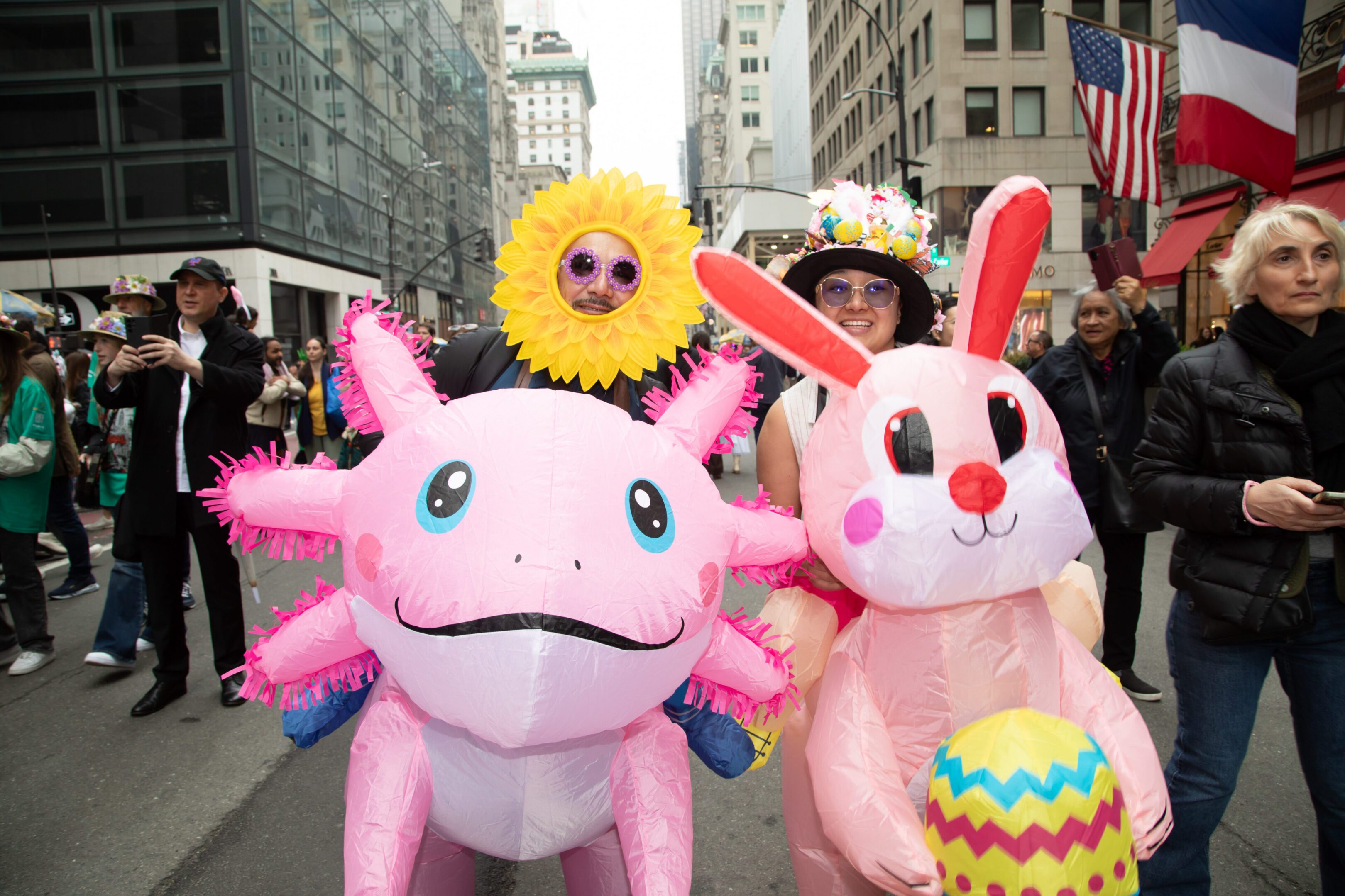 People in colorful inflatable costumes at parade