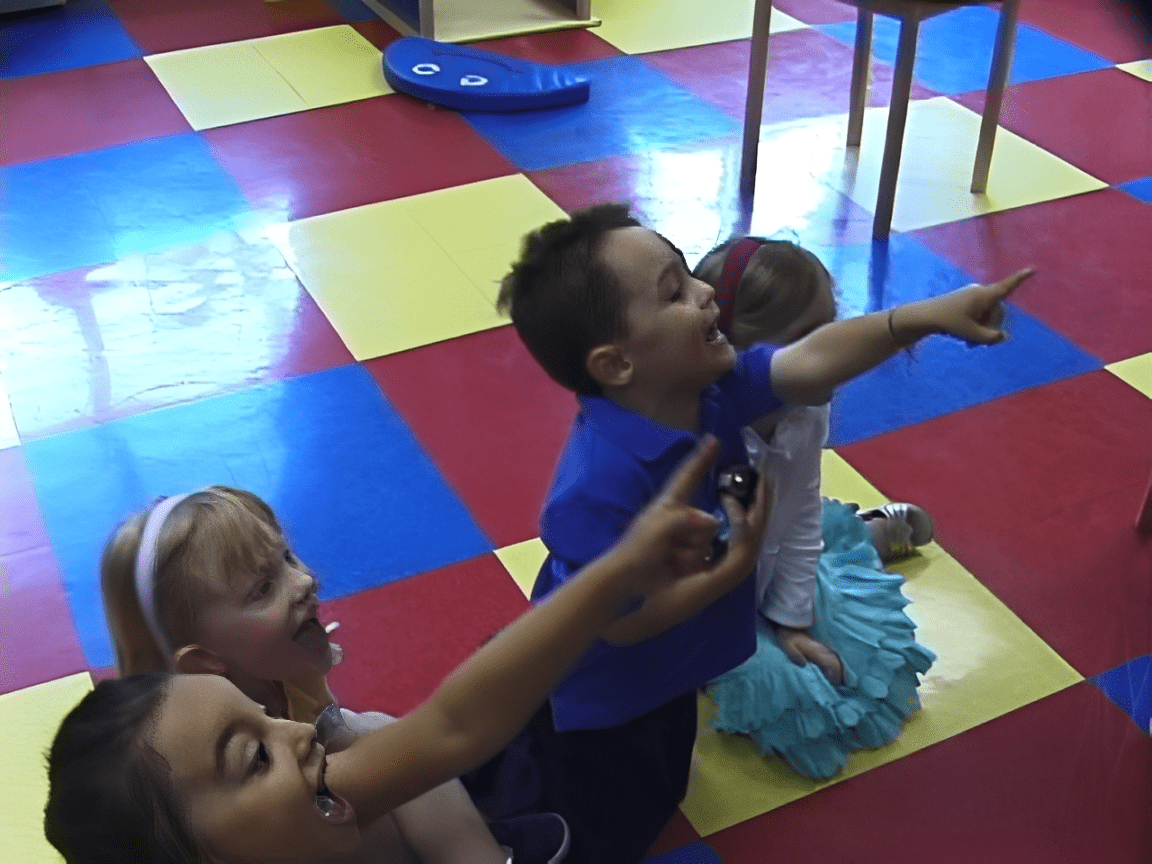 Kids enjoying playtime on colorful floor