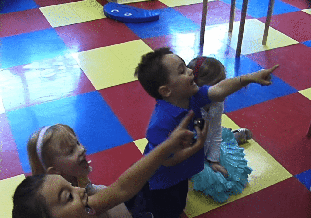 Kids enjoying playtime on colorful floor